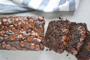 Baked Chocolate Zucchini Bread with melted chocolate.